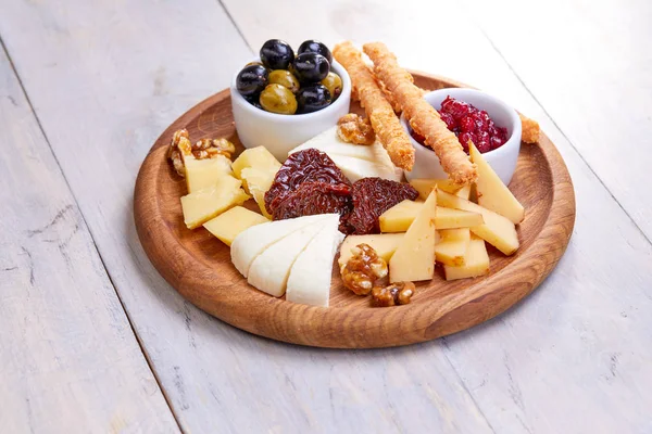 Cheese Plate Olives White Wooden Background Close — Stock Photo, Image