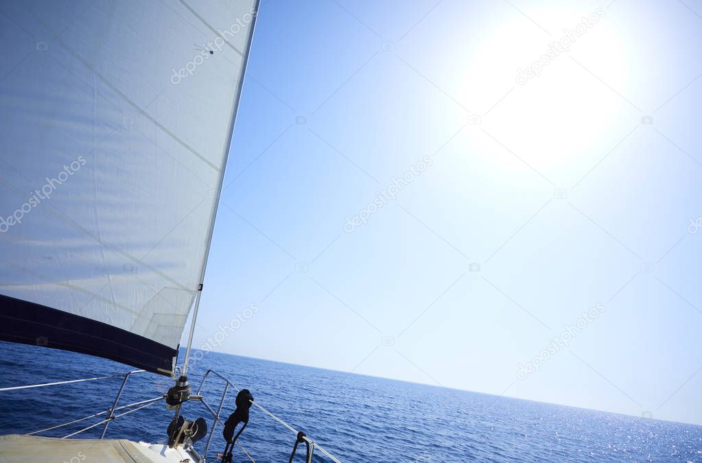 yacht floating in sea at sunny day