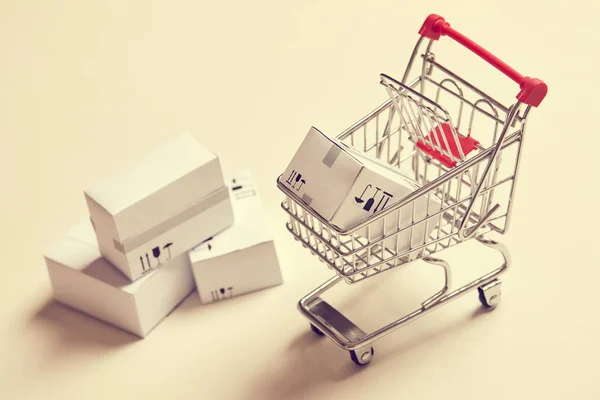 Shopping Trolley Boxes Light Background Close — Stock Photo, Image