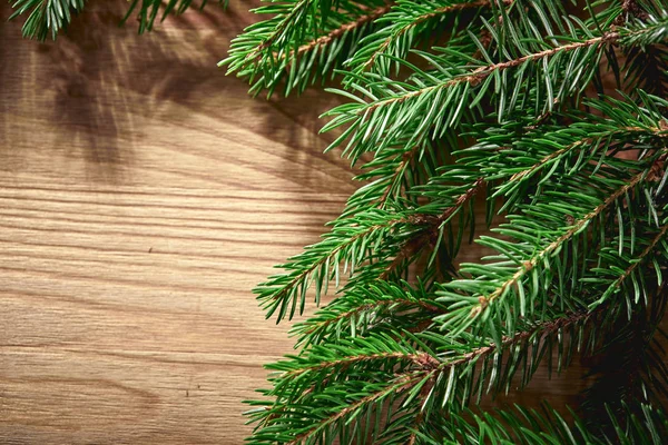 Ramas Árbol Navidad Sobre Fondo Madera —  Fotos de Stock