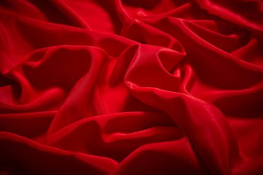 Kutlama, tören, davet kartı veya reklam afişi için lüks kırmızı saten düz kumaş arkaplan