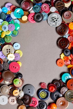 Masadaki çok renkli düğmelerin arkaplan ve dokusu