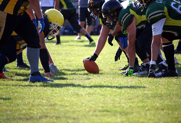 American football players on the scrimmage line sport