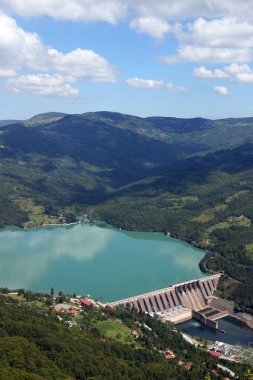hydroelectric power plant Perucac on Drina river and hills landscape Serbia clipart