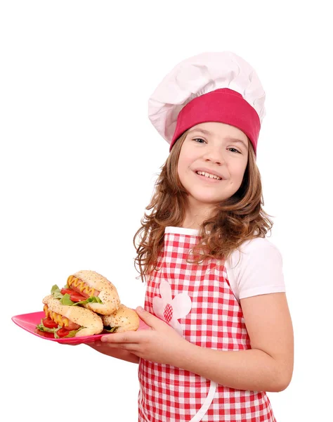 Feliz Niña Cocinero Con Hot Dogs Comida Rápida — Foto de Stock