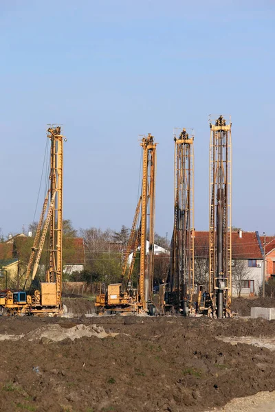 Four hydraulic drilling machines on construction site industry — Stock Photo, Image