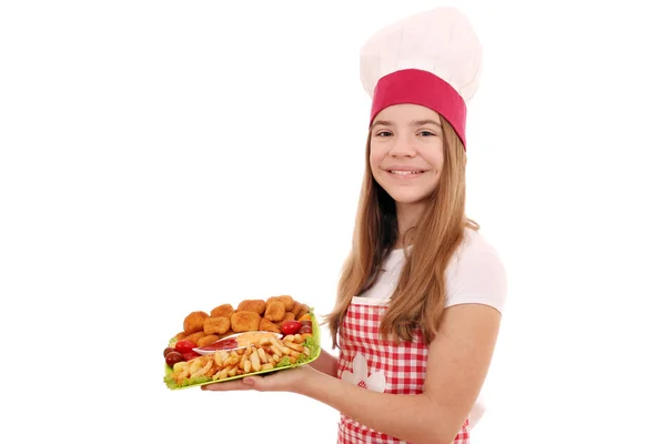 Chica feliz cocinero con pepitas de pollo en el plato —  Fotos de Stock