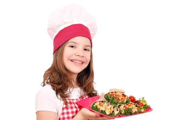 Gelukkig klein meisje cook met burrito's fast food — Stockfoto
