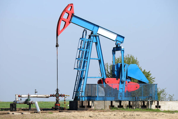 Pump jack on field oil and gas industry