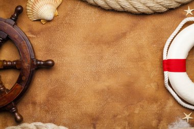 Deniz ve Yatçılık sembolleri - geminin direksiyon simidi, lifebuoy ve Kağıt arka plan üzerinde hawser