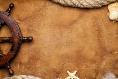 Arka plan - geminin direksiyon simidi ve hawser kağıt sayfası Yatçılık