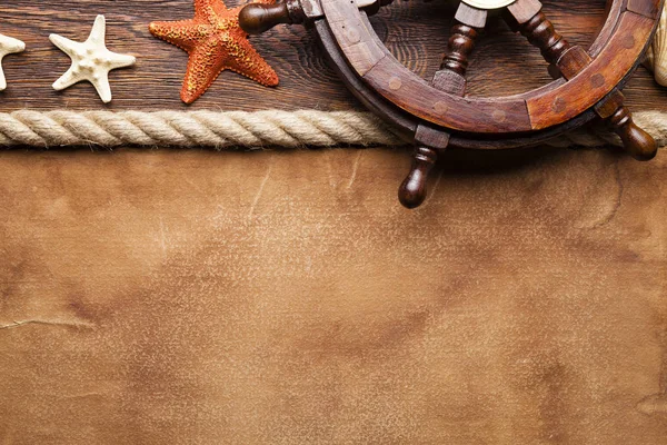 Ship Steering Wheel Shell Starfish Hawser Paper Wooden Background — Stock Photo, Image