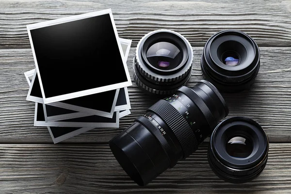 Lenses Photo Frames Wooden Table — Stock Photo, Image