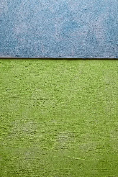Deux couleurs vert et bleu surface inégale du mur plâtré — Photo