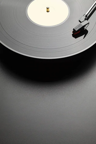 Black vinyl record player on black table background — Stock Photo, Image