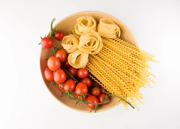 Bowl Raw Pasta Tomatoes Isolated White Background Top View Flat — Stock Photo, Image