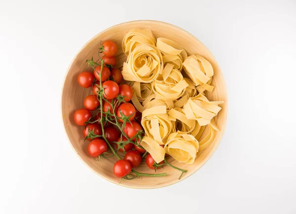 Bowl Raw Pasta Tomatoes Isolated White Background Top View Flat — Stock Photo, Image