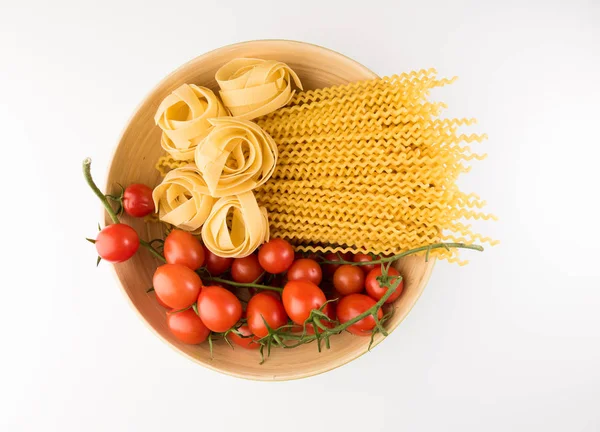 Bowl Raw Pasta Tomatoes Isolated White Background Top View Flat — Stock Photo, Image