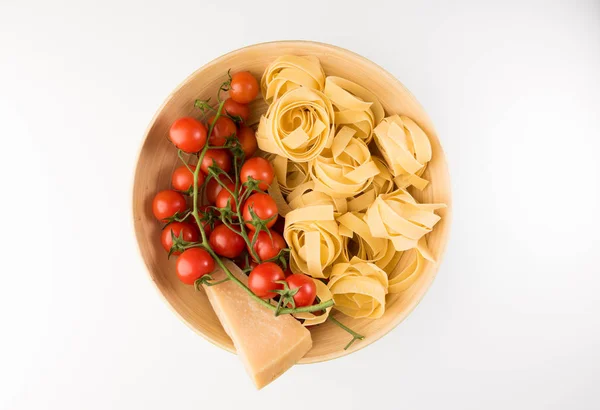 Bowl Raw Pasta Tomatoes Parmesan Cheese Isolated White Background Top — Stock Photo, Image