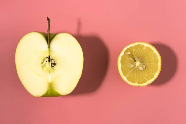 Sliced Lemon Green Apple Pink Background Contrast Shadows — Stock Photo, Image