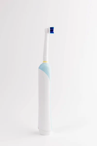 Electric Toothbrush Stands Isolated White — Stock Photo, Image