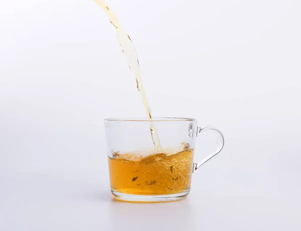 Tea Pouring Cup Isolated White — Stock Photo, Image