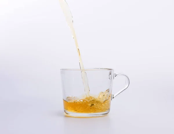 Tea Pouring Cup Isolated White — Stock Photo, Image