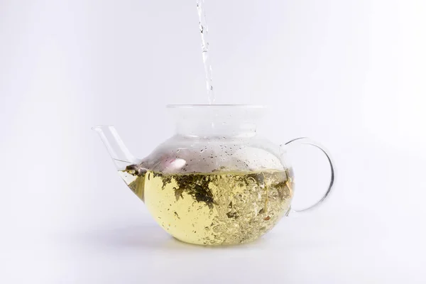 Pouring Hot Water Glass Teapot Herbal Tea Isolated White Background — Stock Photo, Image