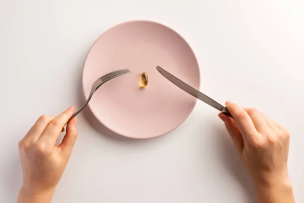 Female Hands Holding Fork Knife Plate Fish Oil Capsule Flat — Stock Photo, Image