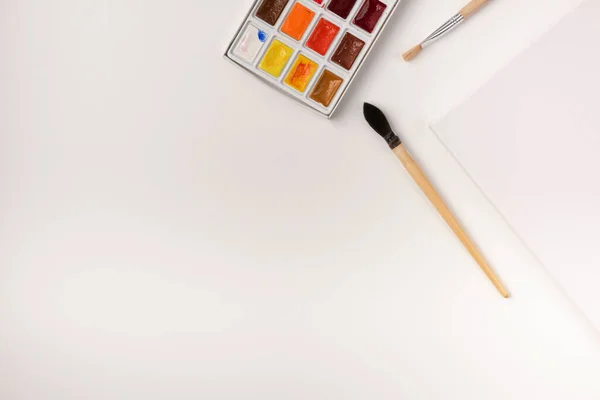 Watercolor Paints Brushes White Canvas White Background Copy Space Top — Stock Photo, Image