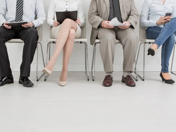 recruitment recruiting hire recruit hiring recruiter interview employment job human room stress stressful position young group formal work chair corporation corporate sitting concept - stock image