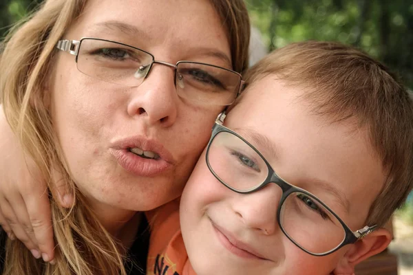 Mather Huging Her Son Kissing Him — Stock Photo, Image