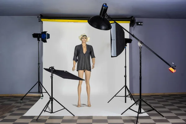 female mannequin and studio lights - Obraz