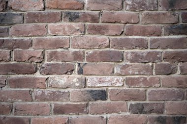 Eski renkli resaturated tuğla duvar doku, arka plan olarak kullanılabilir