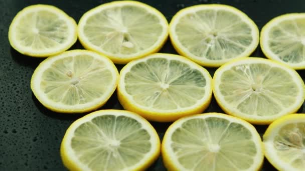 Sliced lemon on table — Stock Video