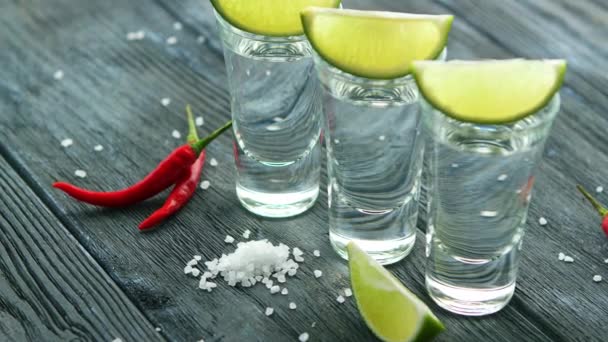 Served Glass Shots Filled Tequila Slices Lime Wooden Table Heap — Stock Video