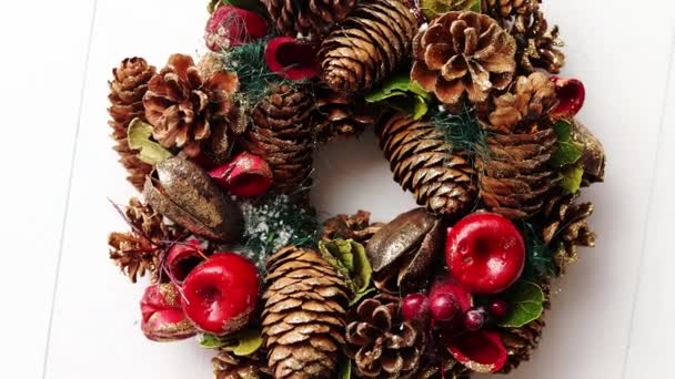 Christmas Wreath on White Wooden Background — Stock Video