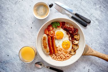 Full English Breakfast served in a pan clipart