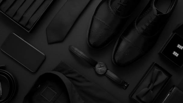 Elegant man clothes concept. Set of black wardobe and accessories for official party evening meeting — Stock Video