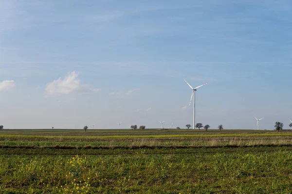 Wind turbines between fields — Stock Photo, Image