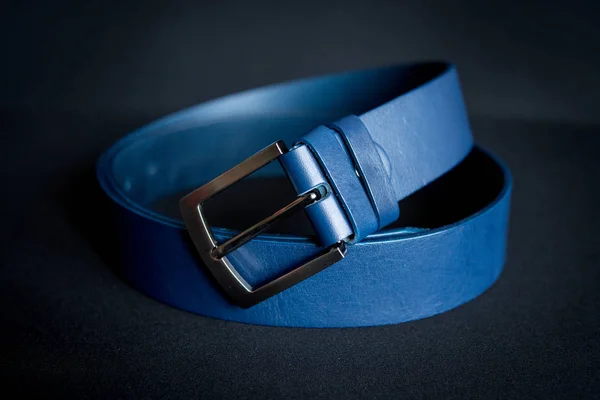 man\'s blue belt