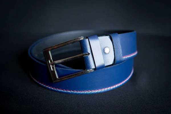 man\'s blue belt