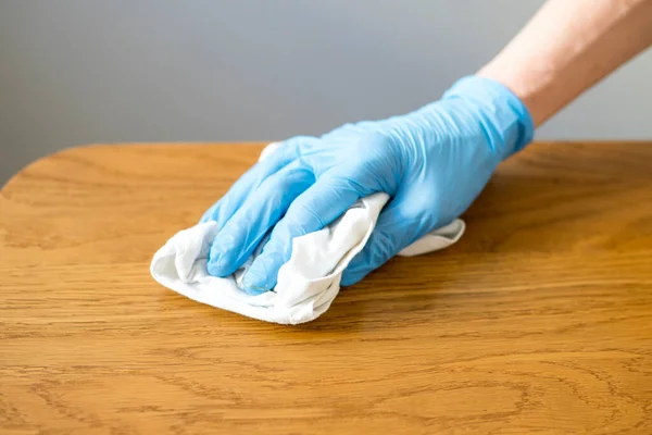 Close Worker Hand Blue Glove Waxing Wooden Table Stock Picture
