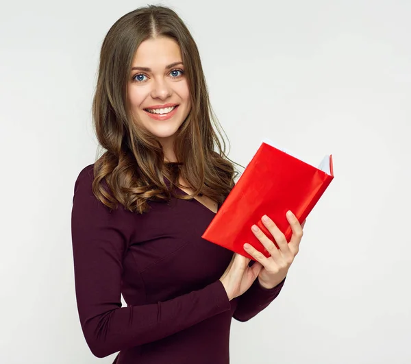 Smiling woman student holding red book isolated on white background