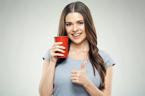 Smiling Girl Holding Red Coffee Cup Showing Thumb Isolated Portrait — Stock Photo, Image