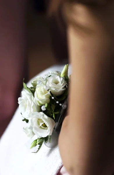 Wedding rose bouquet in hand