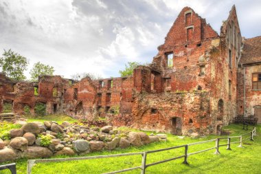 The ruins of the castle of Insterburg, the East Prussian medieval defensive structure.  Chernyakhovsk sity clipart