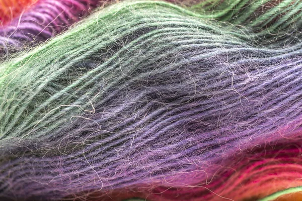 Multi-colored woolen threads in a ball