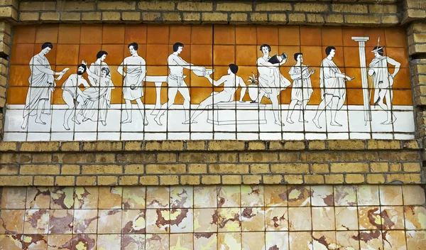 Eine Tafel mit dem Bild des Badens in alten römischen Begriffen. — Stockfoto