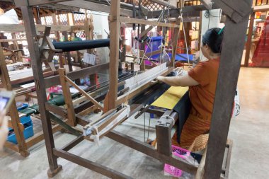 Tayland 'daki bir fabrikadaki ipek tel yığınının görüntüsü.